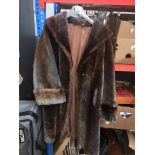 A full length beaver lamb fur coat