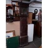 A Georgian oak long case clock, brass dial signed Thomas Daniel Kirkham, with pendulum.