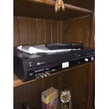 A Panasonic DMR- EZ47VEB dvd recorder with remote