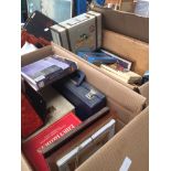 2 boxes of assorted items including music cassettes, boxed set of Laurel and Hardy DVDs ets