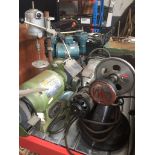 A bench grinder, angle grinder, compressor, and Vitos belt dfriven motor