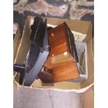 A box of misc items including guillotine, lantern flower pot, bookrest etc