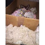 Two boxes of crochet.