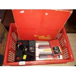 A box of Triang/Hornby model train accessories, including Loco regulators, train controllers, and