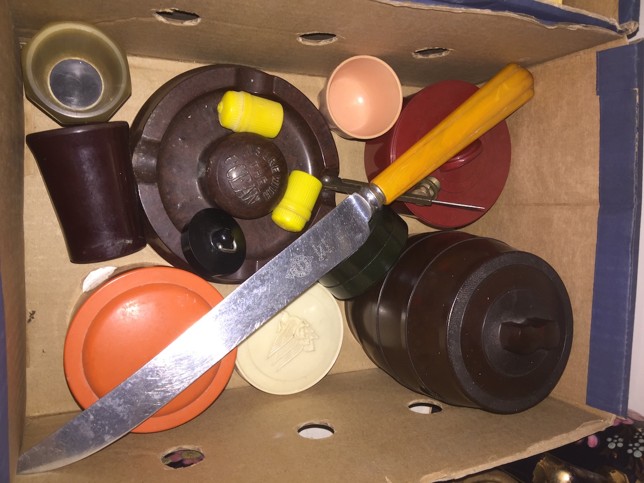 Box of vintage bakelite items and containers