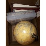 A box of stamps and a terrestrial globe, inc. stamp albums, one with GB QEII onwards, the other is