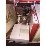 A box of mixed items including prints, christmas items, lazy susan, etc