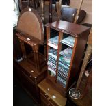 Four items of furniture comprising a CD rack, a drop leaf table, a nest of two tables and a