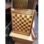 A vintage Sorrento chess top games table.