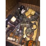 A wicker basket and contents including napkin rings etc.
