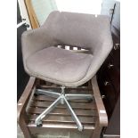 A retro swivel office chair labelled Project Office Furt.