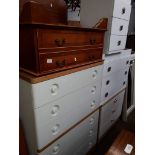 Nine items of furniture comprising a retro chest of drawers, a yew wood AV stand, two veneered