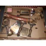 A box of brass and silver plate including a turnstile counter.