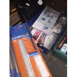 A box of mixed items including juicer, CDs, place mats and coasters and telescopic window cleaning