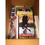 A box of football related books
