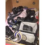 A collection of cameras to include, 1 x olympus OM10, 2 x olympus E410 (one with sensor fault), 1