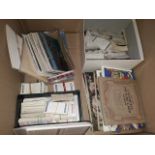 A box of cigarette collectors cards and postcards