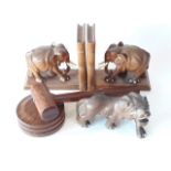 Assorted wooden items comprising a pair of elephant bookends, an eastern tiger and a gavel.