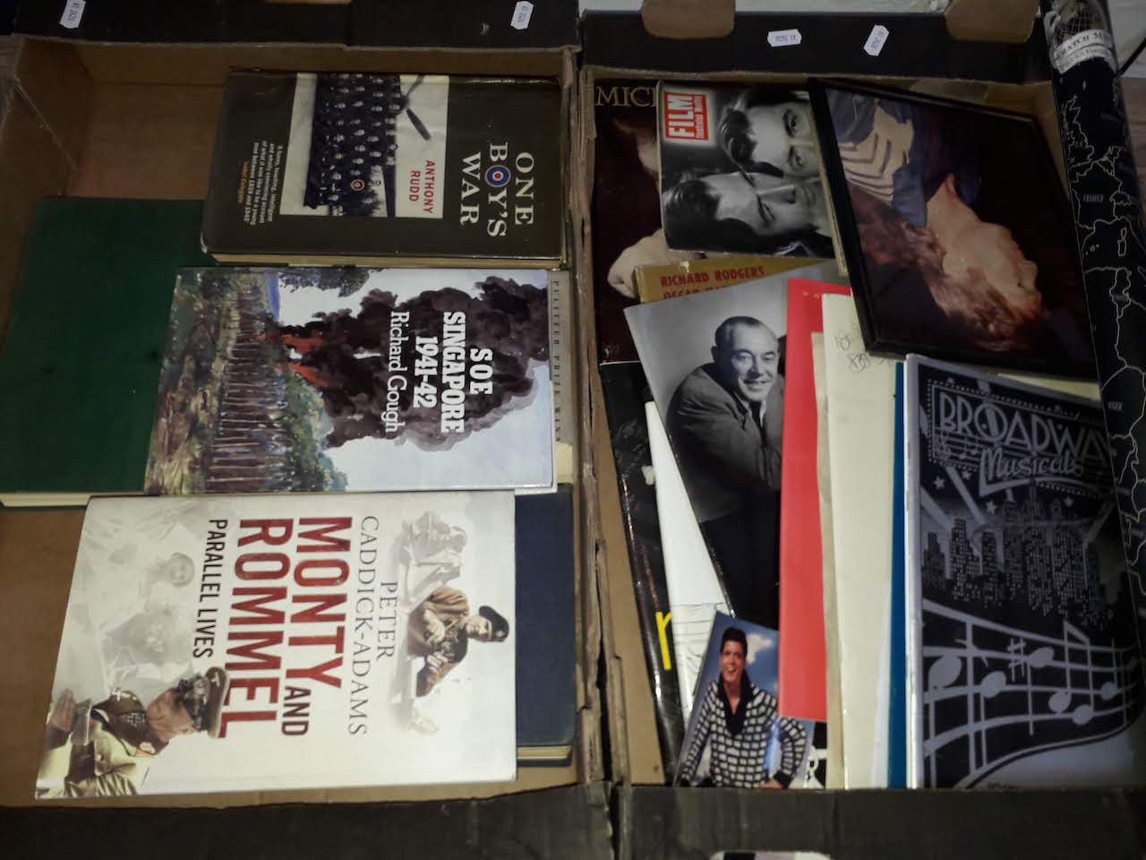 A box of military books and a box of mainly music ephemera.