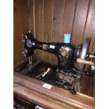 A hand cranked CWS Family sewing machine