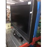 A Panasonic 26 inch lcd television with remote