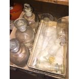 A box of laboratory glassware including chemists bottles