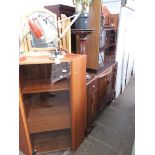 Four items of furniture comprising a glazed corner cabinet, a similar bookcase, an open bookcase and