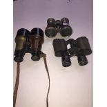 Three pairs of vintage binoculars