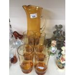 Whitefriars style amber glass waterjug set