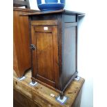 An Arts & Crafts style oak pot cupboard, H76cm, W45cm, D46cm.