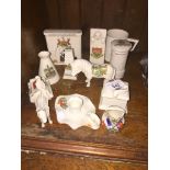 Eleven pieces of crested china