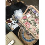 A crate and wicker baskets/boxes of sewing items