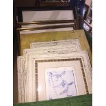 A box of framed prints
