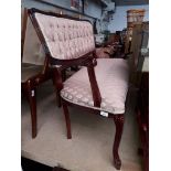 A two seater salon settee.