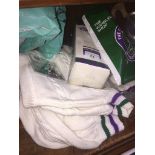 Various Wimbledon related tennis equipment, including sweater, socks, polo shirt and keyrings