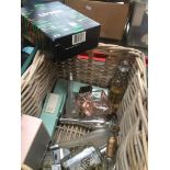 A basket of perfume bottles (some empty) including Ralph Lauren