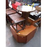 An oak pedestal bar type table, an oak stool and a low teak corner cabinet.