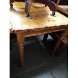 A pine square table, H74cm, W91cm, D74cm.