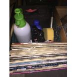 A box of miscellaneous including LPs, garden sprayer, light stick, car shampoo etc