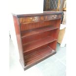 A reproduction mahogany open bookcase with two upper drawers by Bridgecraft, width 100cm, depth 30cm