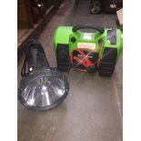 A Professional Power Station (tyre compressor, charger etc) and as large spotlight/ work light