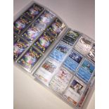 A collection of 112 Japanese Pokemon cards including 17 hologram