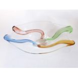 A Murano glass dish decorated with swirls of red, blue, yellow and green, length 45cm.