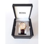 A Hugo Boss wristwatch.