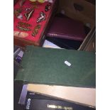 A box of stamp albums and first day covers