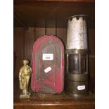 A vintage Naylors miners lamp, Acme sandwich box, and brass figure of a miner