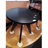 A modern retro style occasional table.