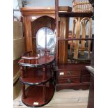 Four items of furniture comprising an open bookcase with lower drawers, a pine corner cabinet, a