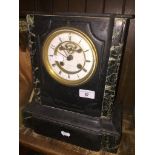 A marble mantle clock