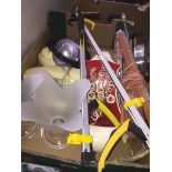 A box of bric a brac including pick sticks, window blinds, house phone, spotlkight lantern